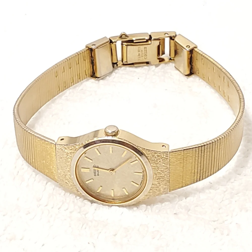 Vintage Seiko Women's Gold Tone Quartz Analog Watch Stainless Steel Base Metal